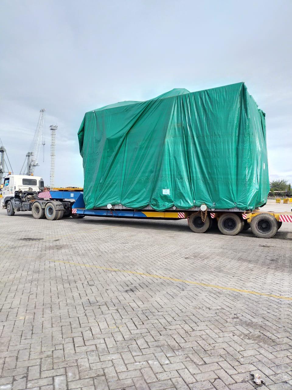 PAL covered cargo trailer documentation in open yard